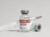 Vaccine target nears as COVID cases surge